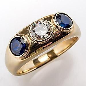 Anillo vintage de oro con incrustación de vidrio azul y zirconio